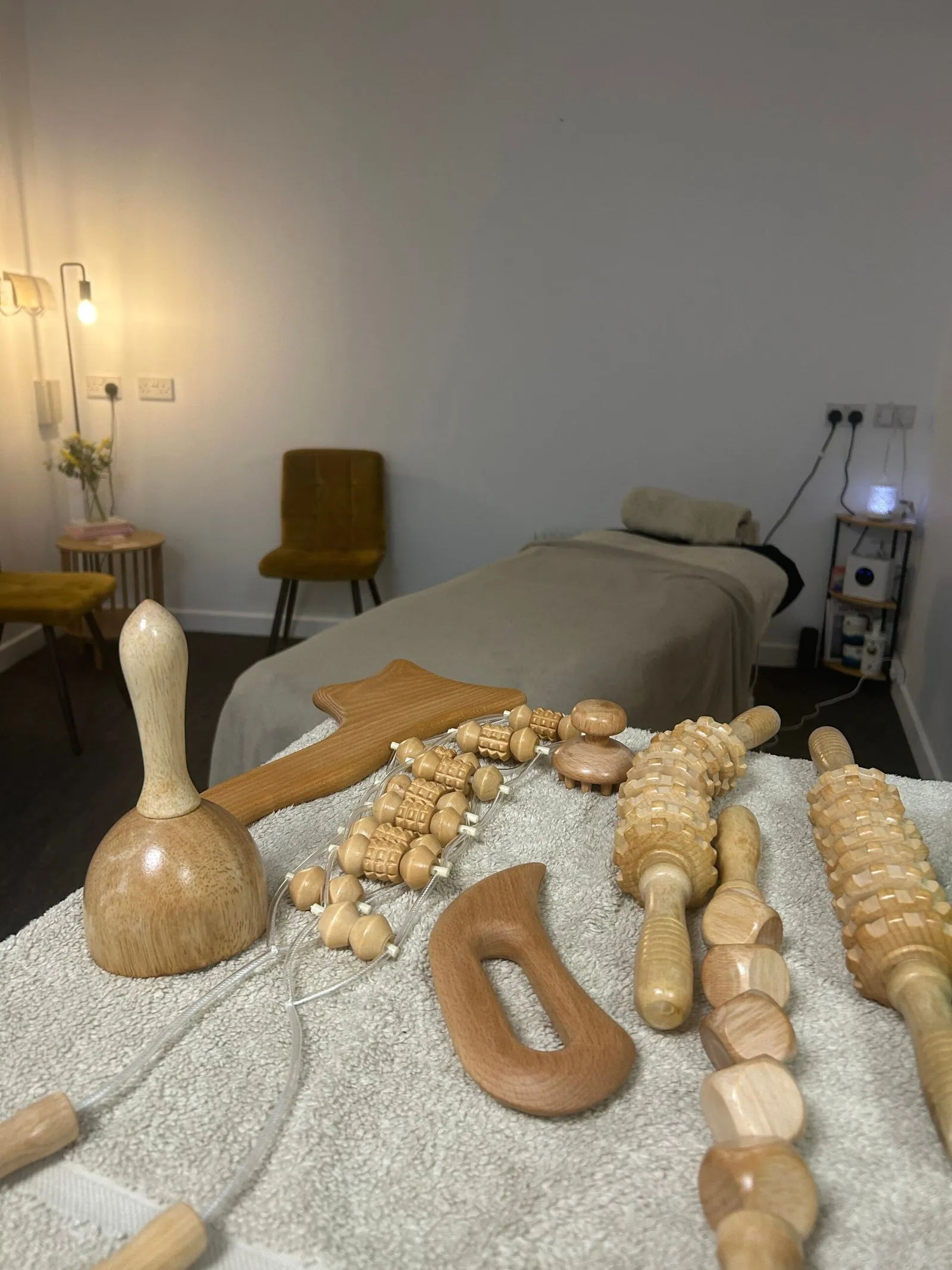 Wooden Maderotherapy tools laid out for body sculpting